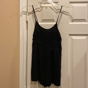 Romper with lace appliqués, adjustable straps, and partially lined